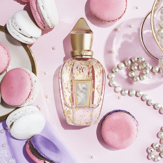 Sleek bottle of Xerjoff Elle Anniversary Parfum, minimalist aesthetic