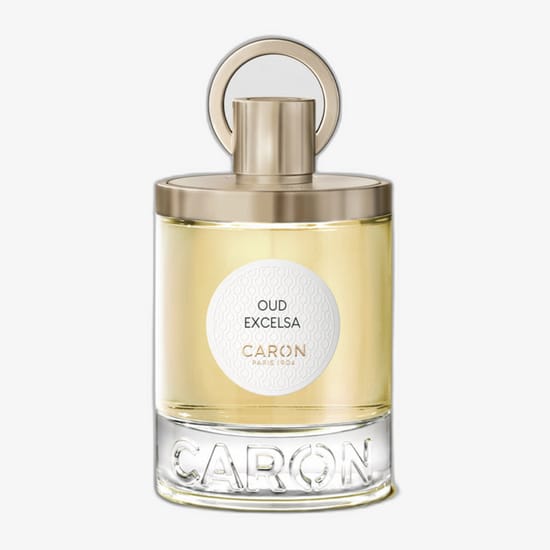 Elegant bottle of caron oud excelsa edp close-up