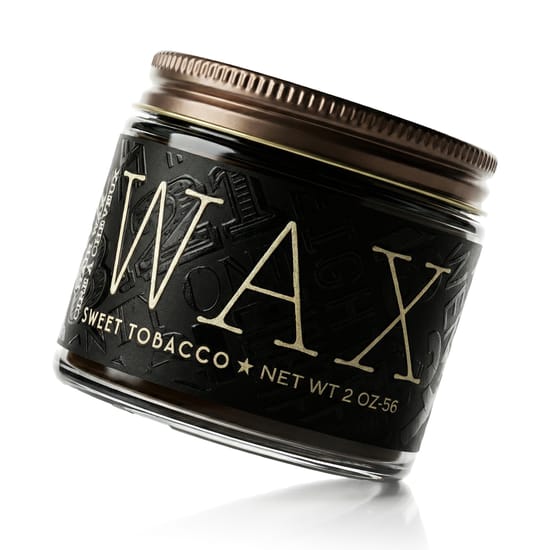 Close-up of 18.21 man made hair wax - sweet tobacco product