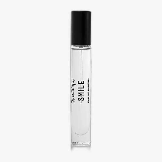 Original packaging of akro smile edp miniature Close-up of akro smile edp miniature bottle