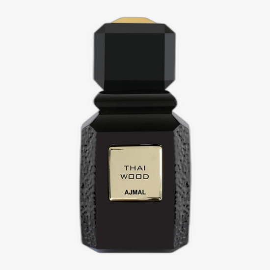 Elegantne pudel Ajmal Thai Wood EDP lähedalt