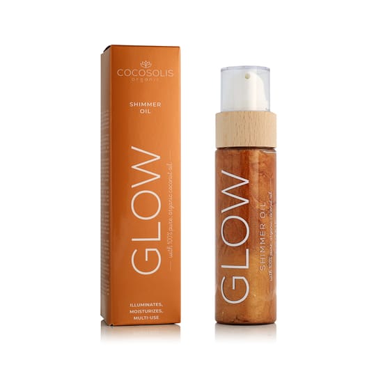 Bottle of cocosolis glow shimmer oil showcasing its shimmer effect