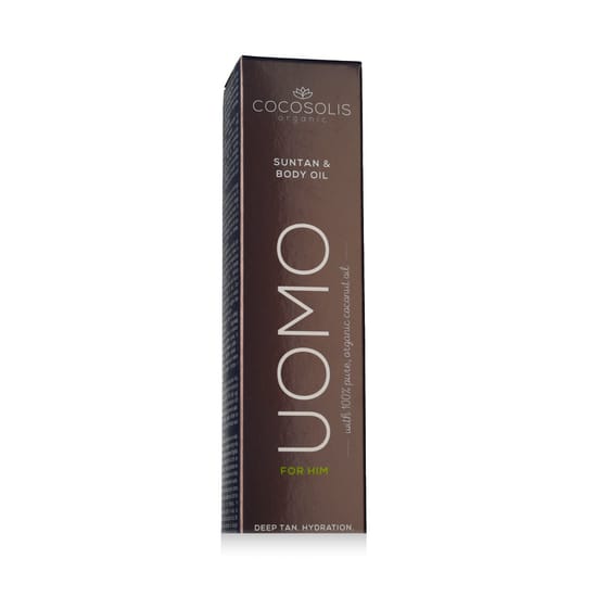 Bottle of cocosolis uomo suntan & body oil on a wooden surface