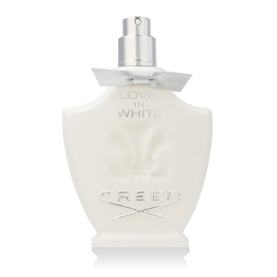 Elegant bottle of Creed Love in White EDP close-up