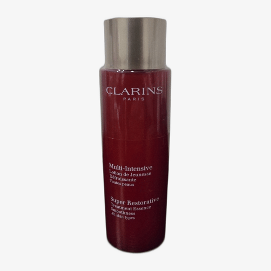 Бутылка средства Clarins Multi-Intensive Treatment Essence Smoothness крупным планом