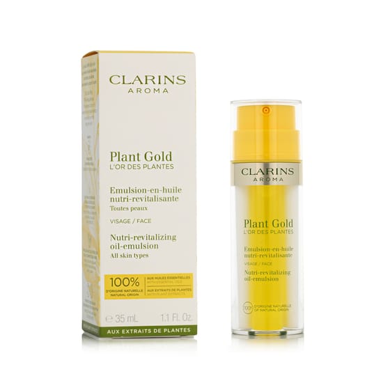 Clarins Aroma Plant Gold Nutri-Revitalizing Oil-Emulsion bottle close-up showing the elegant, dual-chamber design