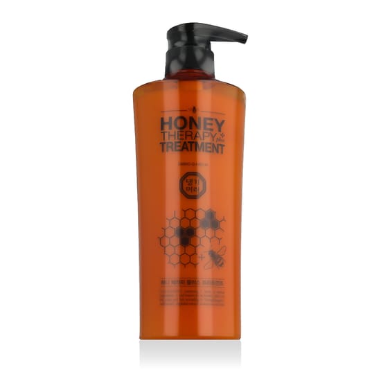 Bottle of Daeng Gi Meo Ri Honey Therapy Plus Treatment for hair care