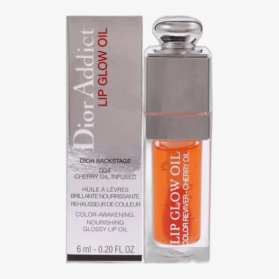 Dior Addict Lip Glow Lip Balm in Coral, showing product texture and subtle tint
