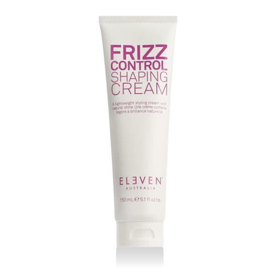Крем Eleven Australia Frizz Control крупным планом на фоне мягкого света, который подчеркивает его нежную текстуру