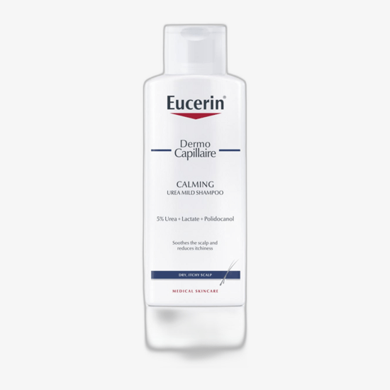 Bottle of Eucerin DermoCapillaire Anti-Dandruff Shampoo designed for unisex scalp care