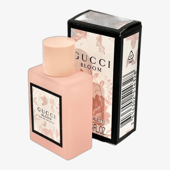 Close-up of Gucci Bloom EDP Miniature bottle, elegant and minimalist floral design