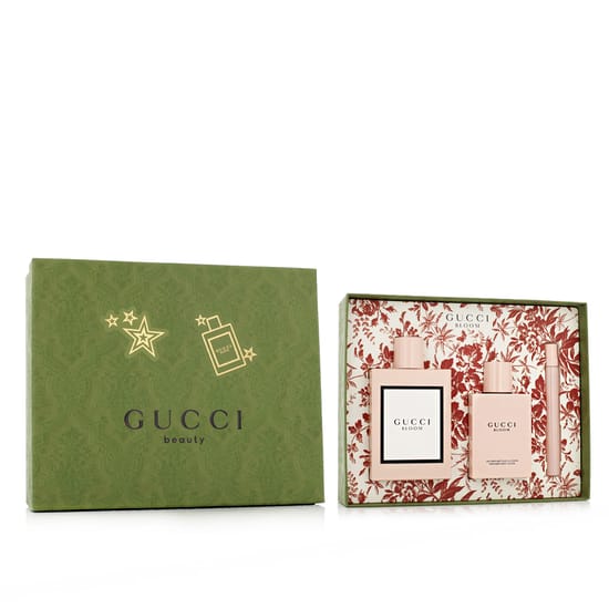 Display of Gucci Bloom EDP 100 ml and mini bottle Gucci Bloom EDP fragrance set with elegant packaging