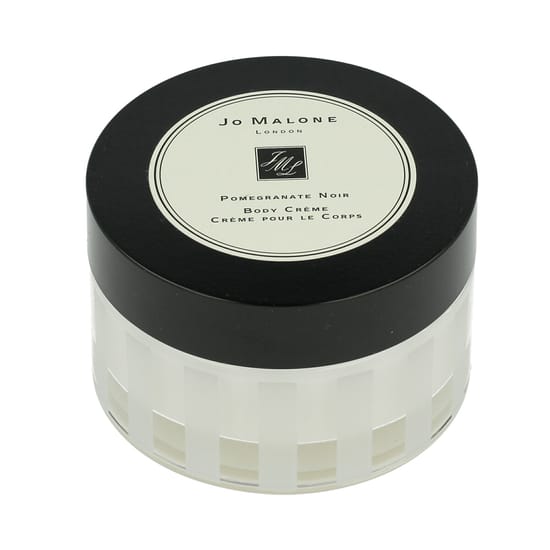 Изящная упаковка крема для тела Jo Malone Pomegranate Noir крупным планом
