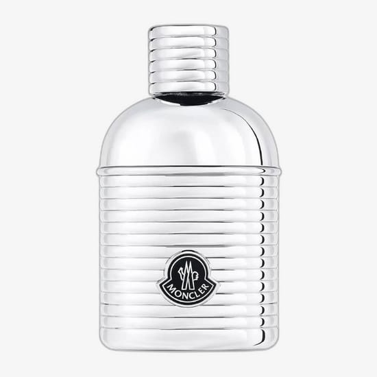 Authentic Moncler Pour Homme EDP packaging design Elegant Moncler Pour Homme EDP bottle, close-up of refined details