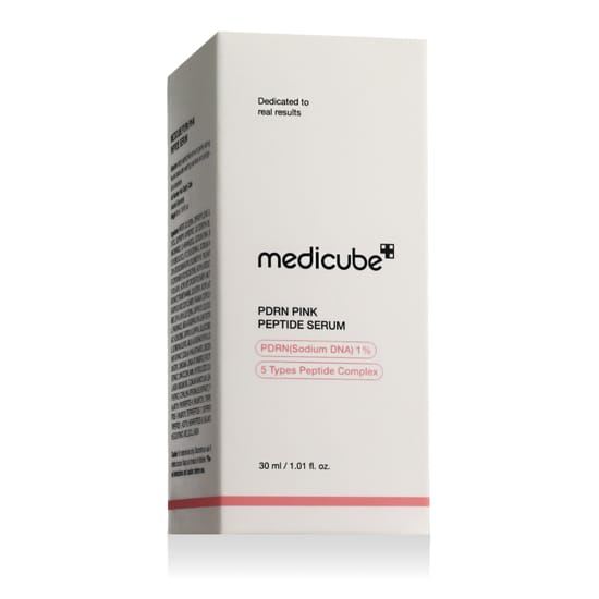 Close-up of Medicube PDRN Pink Peptide Serum bottle