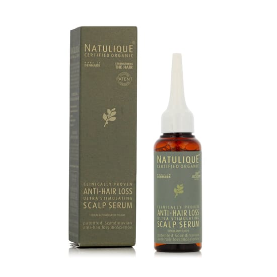 Бутылочка сыворотки Natulique Anti-Hair Loss для кожи головы – крупный план