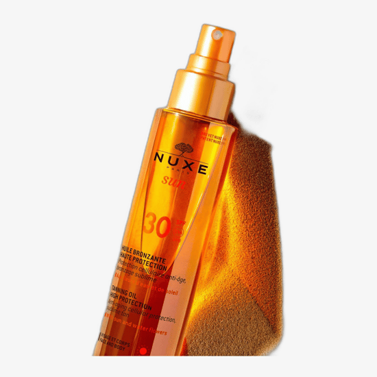 Bottle of Nuxe Sun Tanning Sun Oil High Protection SPF 10