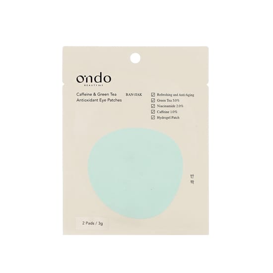 Close-up of Ondo Beauty 36.5 BAN-JJAK caffeine and green tea antioxidant eye patches enveloped in a fresh, hydrating gel texture