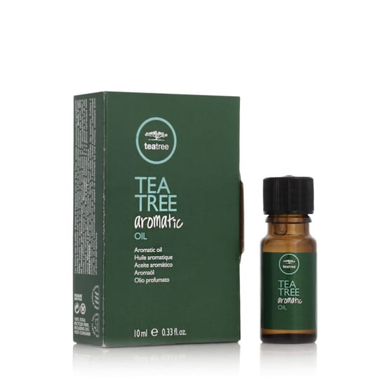 Packaging of Paul Mitchell Tea Tree Aromatic Oil Close-up of Paul Mitchell Tea Tree Aromatic Oil bottle