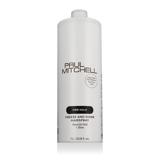 Бутылка лака для волос Firm Hold Freeze and Shine крупным планом