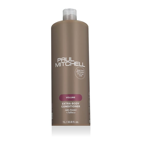 Бутылка кондиционера Paul Mitchell Volume Extra-Body крупным планом