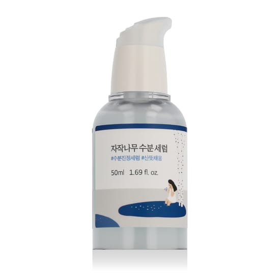 Упаковка Round Lab Birch Juice Moisturizing Serum Бутылка Round Lab Birch Juice Moisturizing Serum с крупным планом