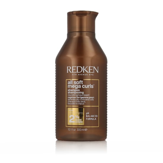 Bottle of redken all soft mega curls shampoo