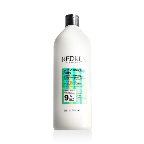Bottle of Redken Acidic Bonding Curls Shampoo 1000 ml