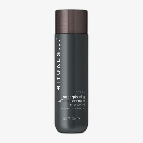 Bottle of Rituals Homme Strengthening Caffeine Shampoo with clear label