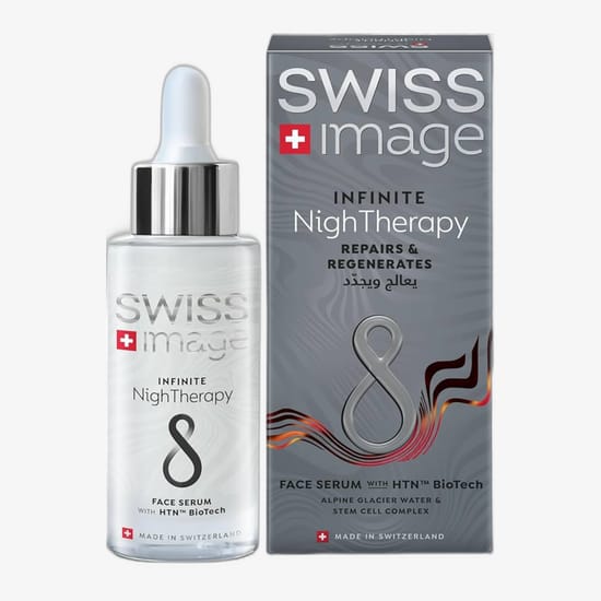 Close-up of Swiss Image Infinite NighTherapy Face Serum Bottle