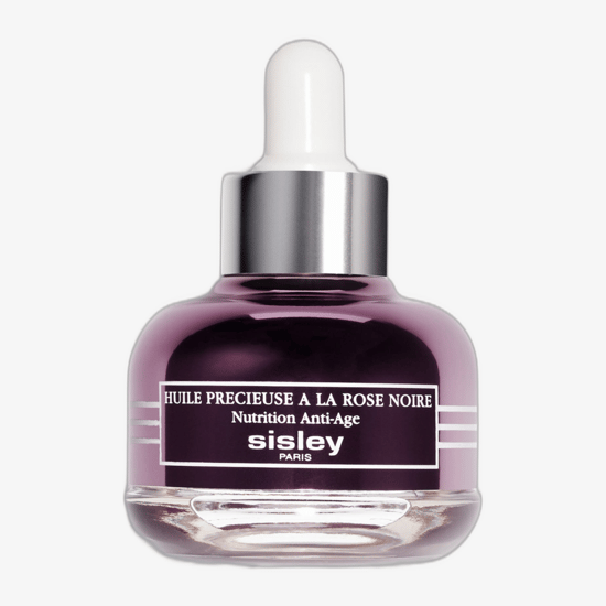 Close-up image of the Sisley Black Rose Precious Face Oil bottle