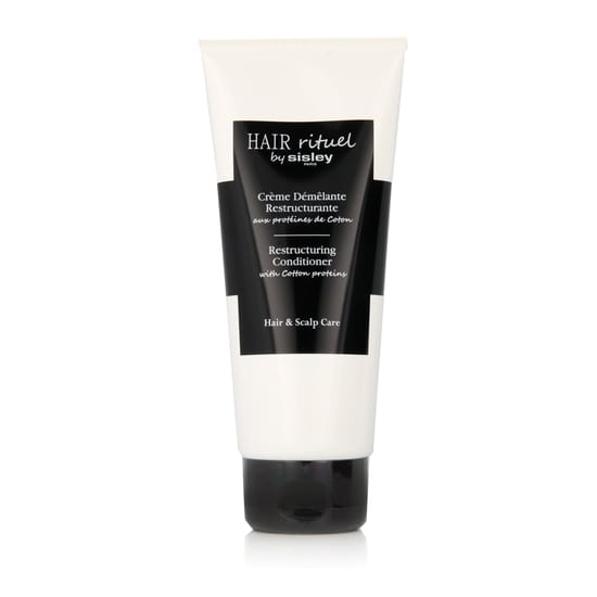 Close-up of sisley hair rituel restructuring conditioner with cotton proteins