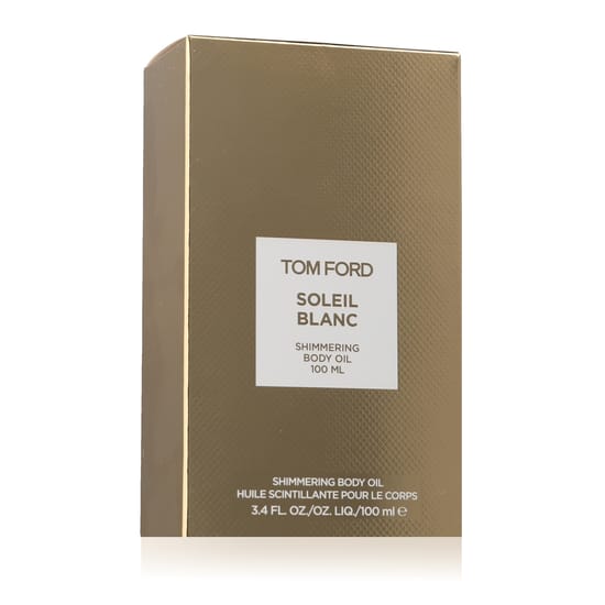 Elegant bottle of Tom Ford Soleil Blanc Shimmering Body Oil radiating a golden shimmer