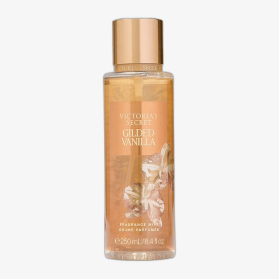Sleek bottle of Victoria's Secret Gilded Vanilla Bodyspray highlighting its elegant design