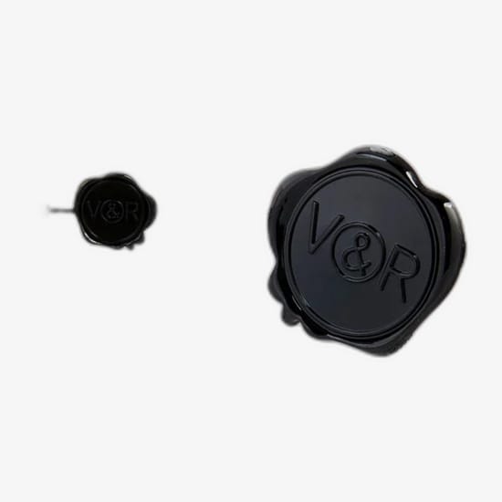 Close-up of elegant Viktor & Rolf Flowerbomb Dew EDP bottle, capturing the luminous and airy essence of the fragrance