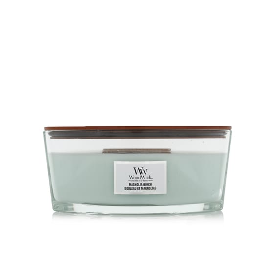 Elegant woodwick ellipse candle in magnolia birch scent