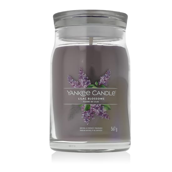 Close-up of yankee candle lilac blossoms scented candle