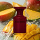 Bottle of borntostandout black mango extrait extrême up close