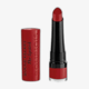 Крупный план матовой помады Bourjois Paris Rouge Velvet оттенок 54 Cherry D’Amour на белом фоне
