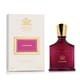 Close-up of the elegant bottle of Creed Carmina EDP