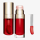 Bottle of moisturizing Clarins Lip Oil (08 Strawberry)