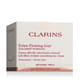 Крупный план баночки с Clarins Extra Firming Jour Day Cream