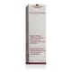 Крупный план флакона Clarins Supra Restorative Remodeling Serum на светлом фоне