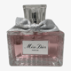 Close-up of Dior Miss Dior Parfum bottle with elegant detailing