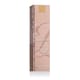 Close-up of Estée Lauder Pure Color Revitalizing Crystal Balm in shade 002 Cosmic Crystal, highlighting its glossy, vibrant finish