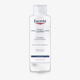 Bottle of Eucerin DermoCapillaire Anti-Dandruff Shampoo designed for unisex scalp care