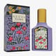 Бутылка Gucci Flora Gorgeous Magnolia вблизи