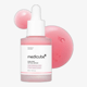 Close-up of Medicube PDRN Pink Peptide Serum bottle
