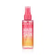 Close-up of Nuxe Happy In Pink Hair & Body Mist bottle