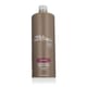 Бутылка кондиционера Paul Mitchell Volume Extra-Body крупным планом